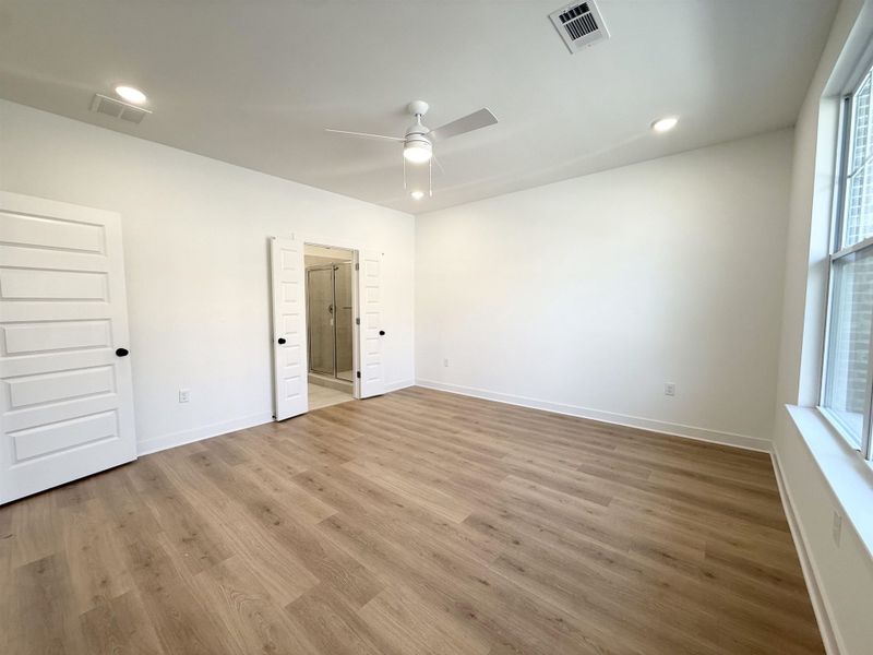 Unfurnished bedroom featuring recessed lighting, wood finished floors, and ceiling fan