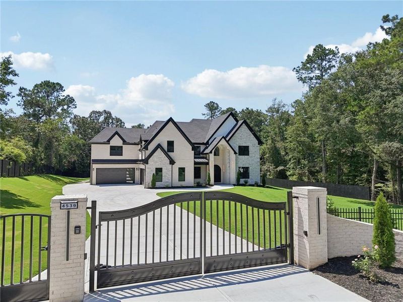 Front exterior of a new home in , Hoschton, GA, highlighting curb appeal (Image 23). Front exterior of a new home in , Hoschton, GA, highlighting curb appeal (Image 23).