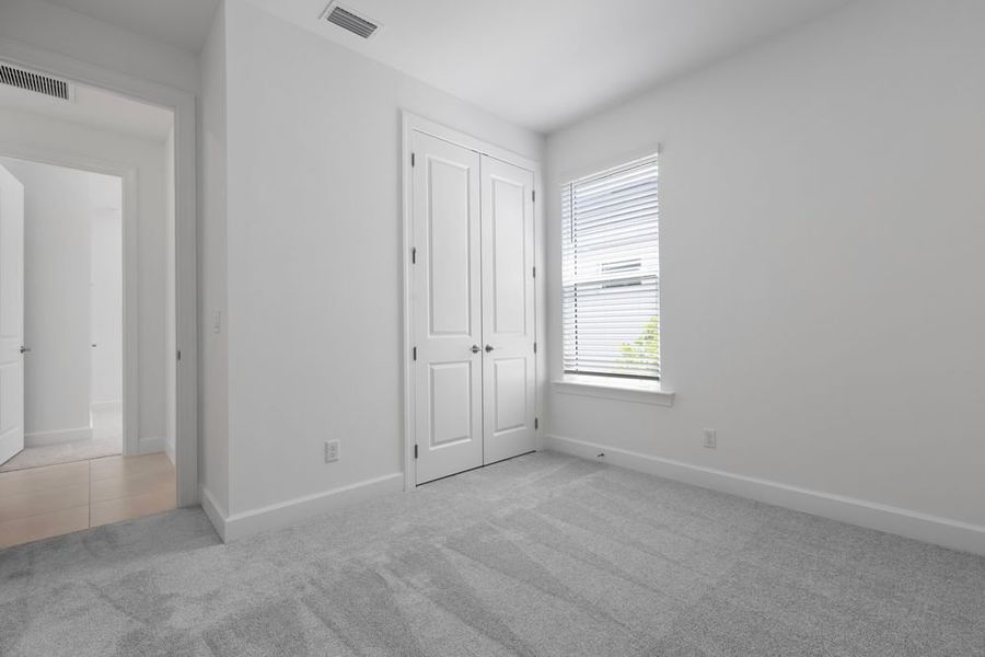 Spacious, unfurnished interior of a new home in Esplanade at Starling, Punta Gorda (Image 6). Spacious, unfurnished interior of a new home in Esplanade at Starling, Punta Gorda (Image 6).
