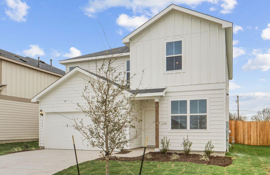 Front exterior of a new home in Larson Crossing, Elgin, TX, highlighting curb appeal (Image 2). Front exterior of a new home in Larson Crossing, Elgin, TX, highlighting curb appeal (Image 2).