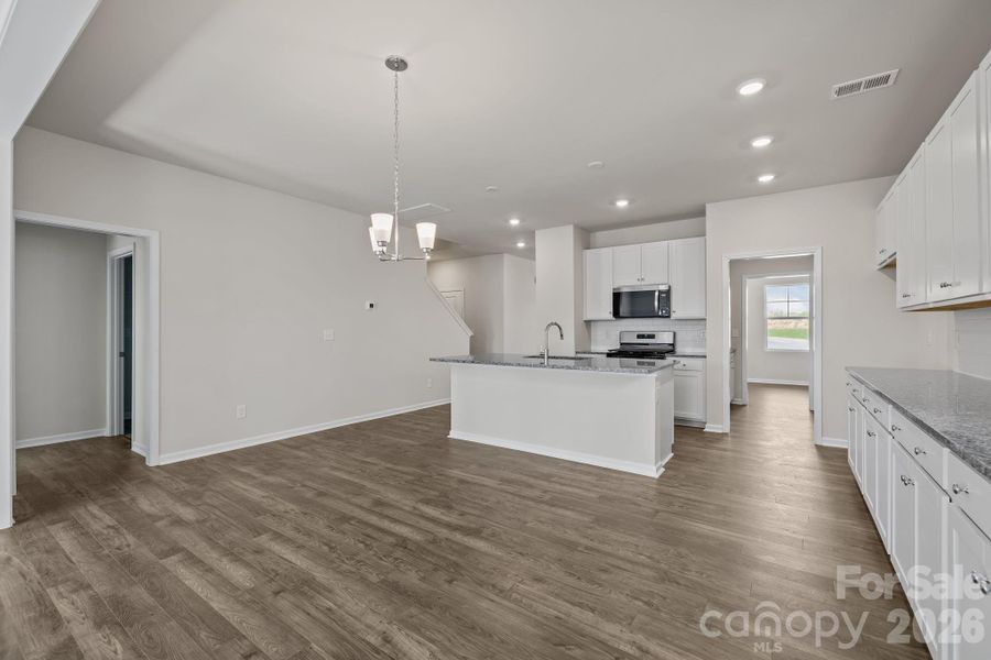 Furnished interior view inside a new home in McFarland Estates, York (Image 9).