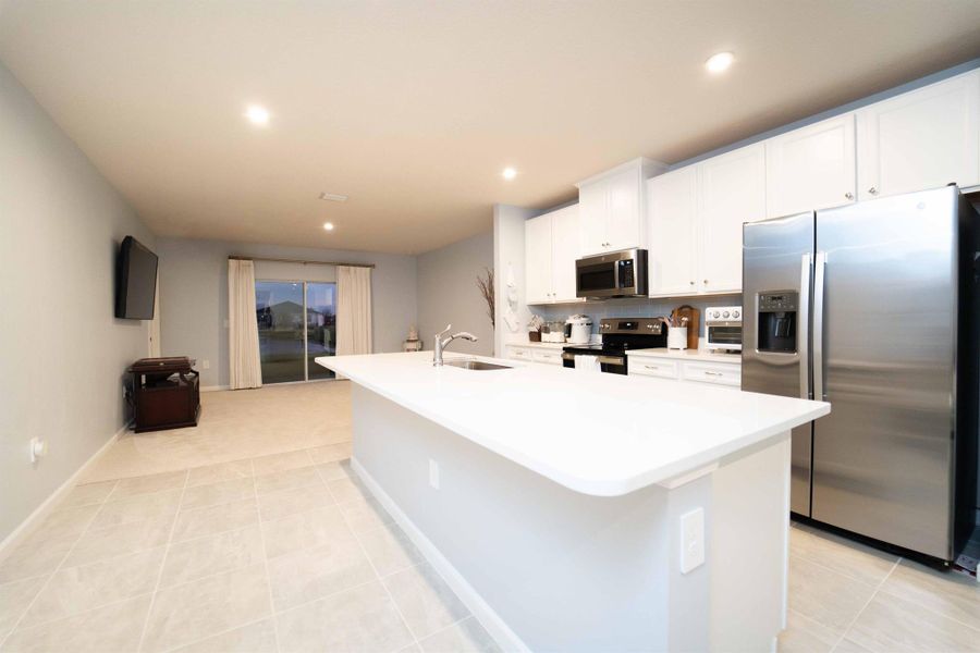 Furnished interior view inside a new home in Central Park Villas, Port St. Lucie (Image 7). Furnished interior view inside a new home in Central Park Villas, Port St. Lucie (Image 7).