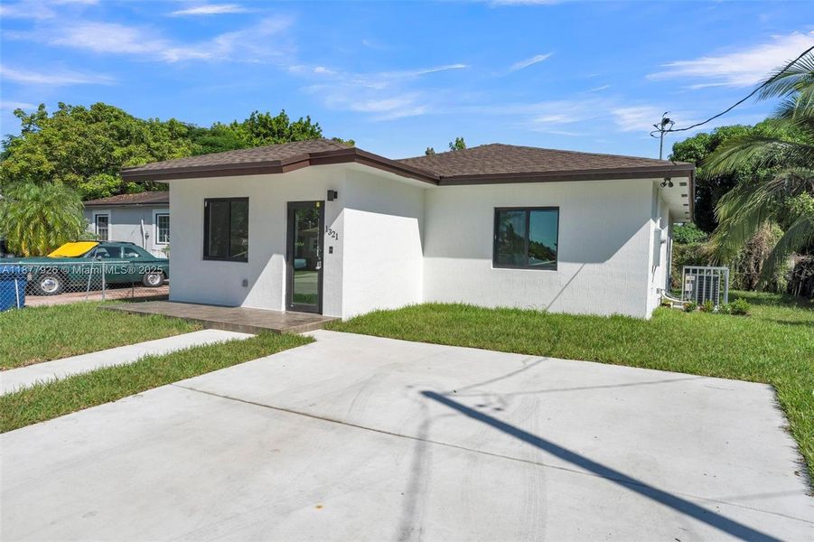 Front exterior of a new home in , Miami, FL, highlighting curb appeal (Image 18).