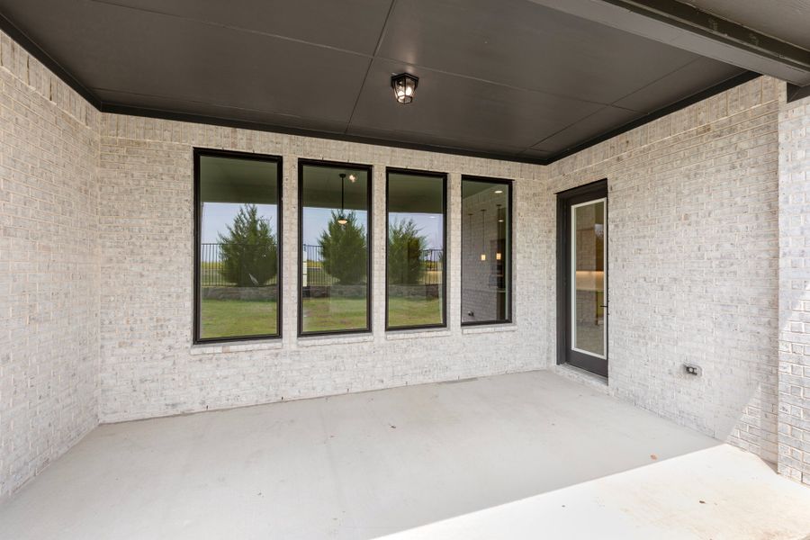 Exterior details and patio area of a home in Nelson Lake Estates, Rockwall (Image 3).
