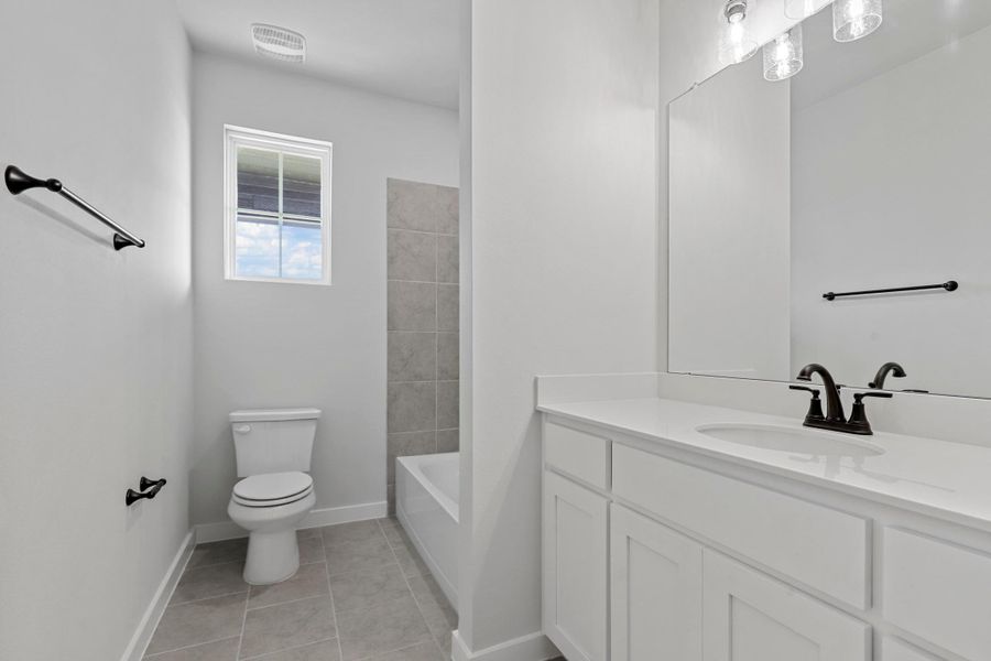 Representative furnished interior of a home built from the Garrison II by Cheldan Homes in Arbor Oaks, Boyd (Image 20).