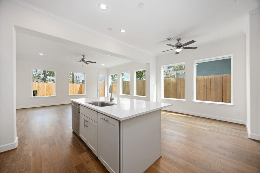 Whether you’re prepping dinner or pouring wine for friends, this oversized island is the hub of the home—anchoring the kitchen, dining, and living areas with ease and elegance.