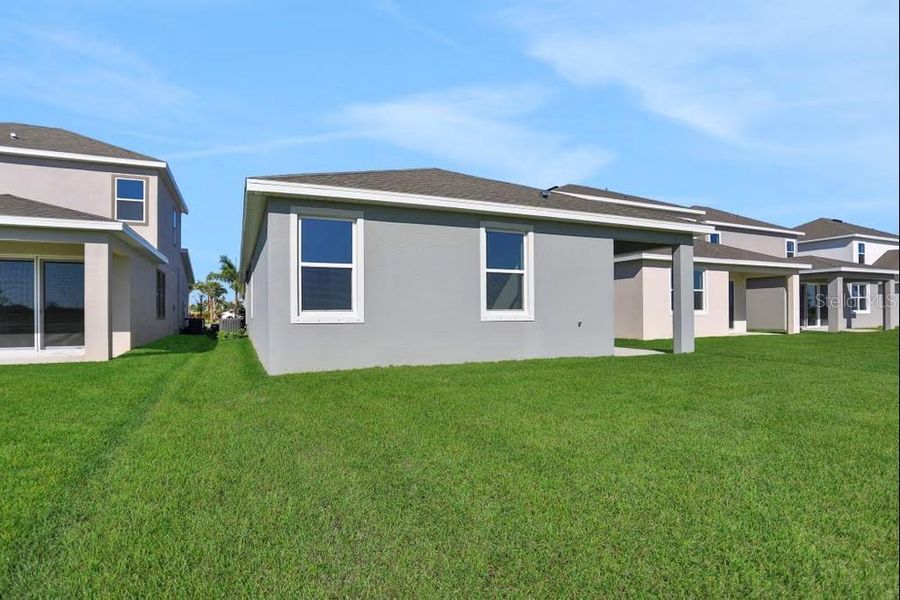 Exterior details and patio area of a home in Turnleaf, Punta Gorda (Image 14).