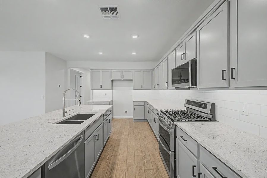 Furnished interior view inside a new home in Avanti at Granite Vista, Waddell (Image 9).