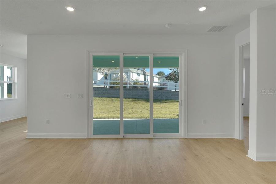 Spacious, unfurnished interior of a new home in Green Key Village, Lady Lake (Image 31).