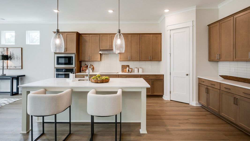 Kitchen with island and various cabinets and countertop spacing