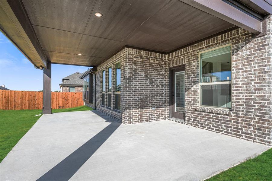 Exterior details and patio area of a home in Meadow Vista 60-65, Anna (Image 4). Exterior details and patio area of a home in Meadow Vista 60-65, Anna (Image 4).