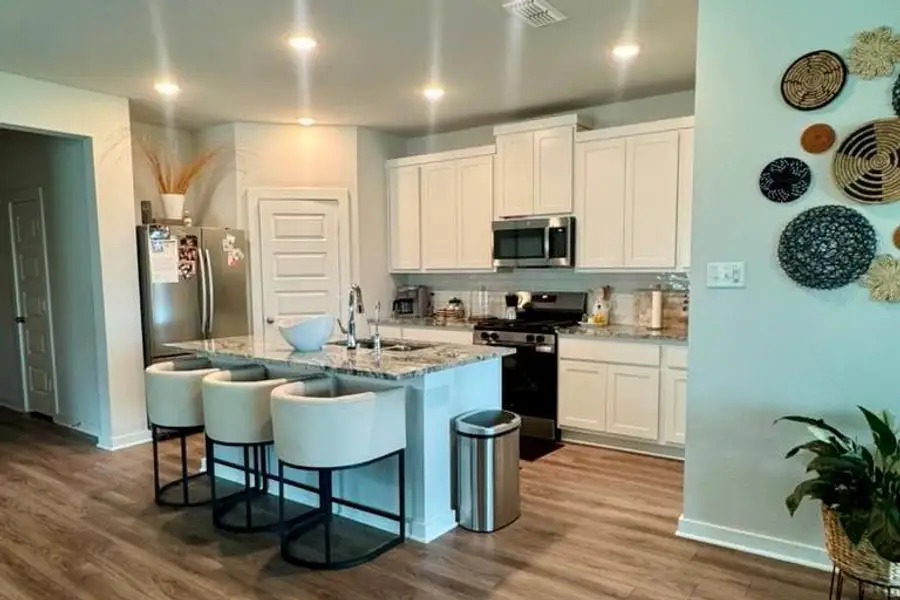 Furnished interior view inside a new home in , Cypress (Image 7).