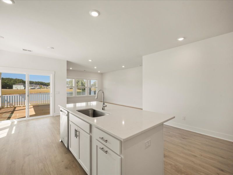 Furnished interior view inside a new home in The Coves at Lakes of Cane Bay, Summerville (Image 13).