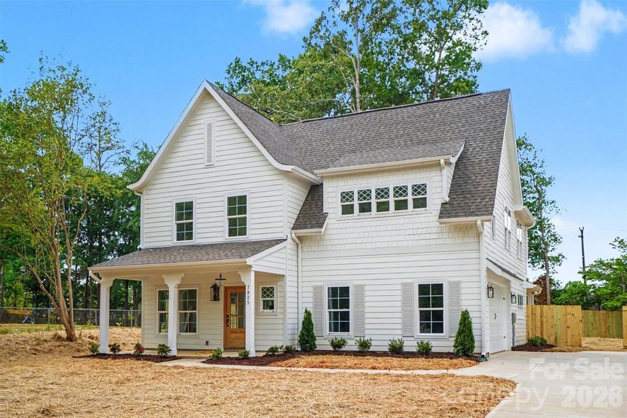 Front exterior of a new home in , Mint Hill, NC, highlighting curb appeal (Image 22).
