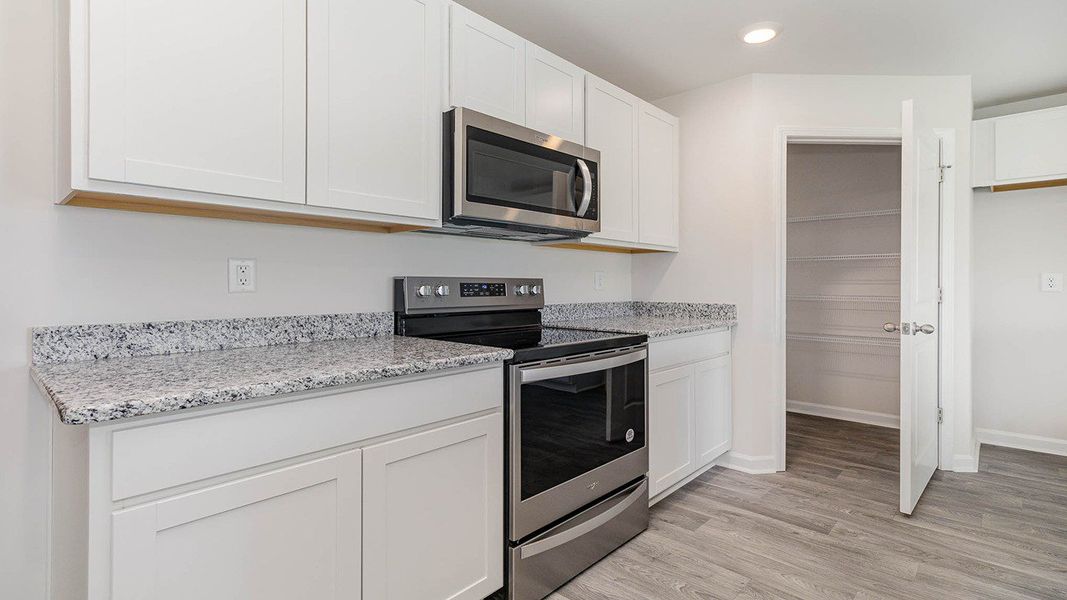 Representative furnished interior of a home built from the CALI by D.R. Horton in Heritage Crossing, Conway (Image 7).