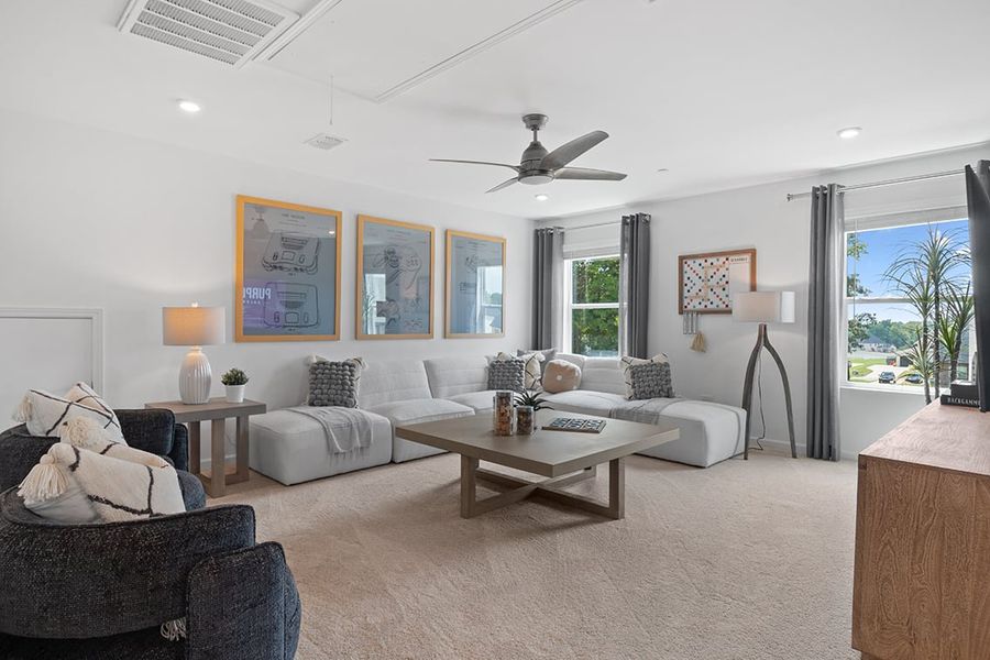 A living room with a large window.