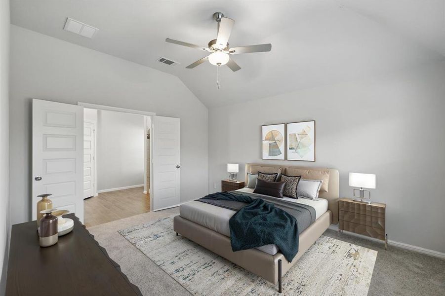 Bedroom featuring lofted ceiling and ceiling fan Bedroom featuring lofted ceiling and ceiling fan
