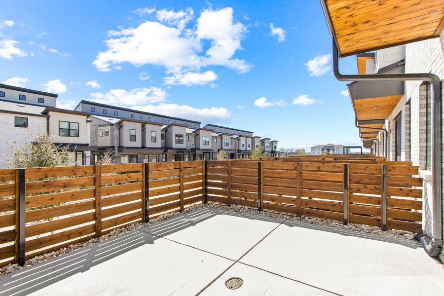 Exterior details and patio area of a home in Willow Grove Townhomes, Melissa (Image 25). Exterior details and patio area of a home in Willow Grove Townhomes, Melissa (Image 25).