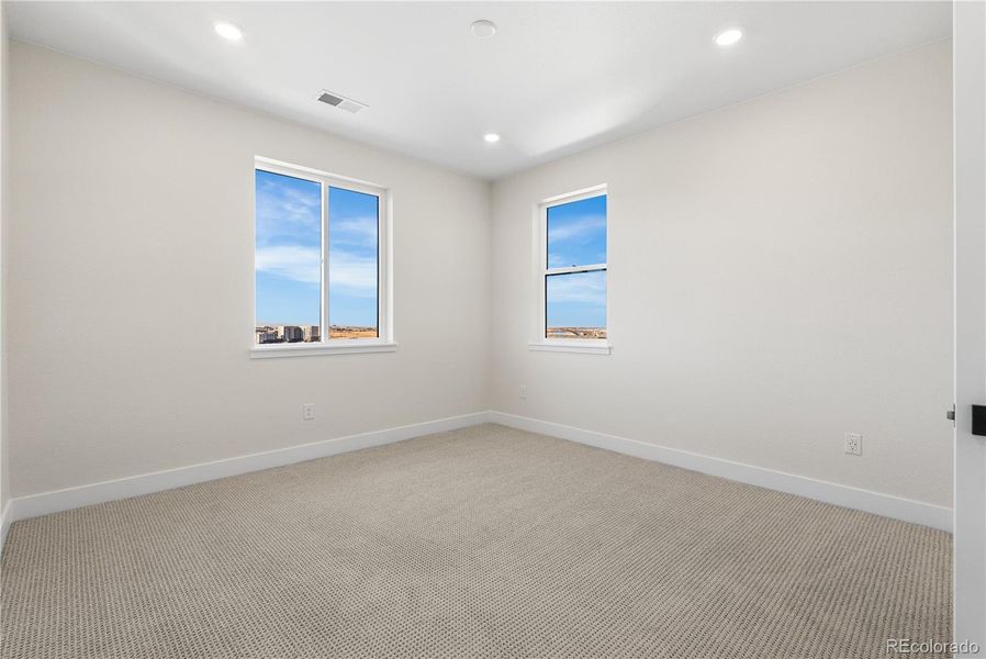 Spacious, unfurnished interior of a new home in Autograph at Lyric, Lone Tree (Image 41).