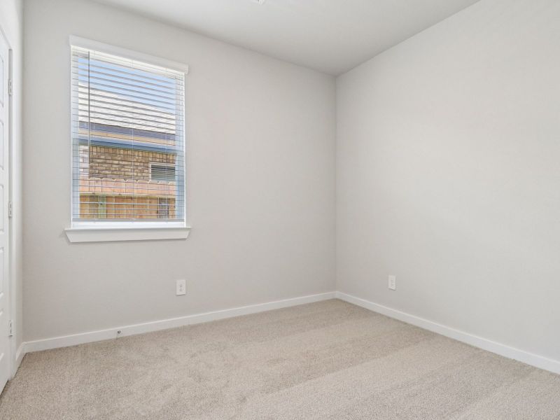 Spacious, unfurnished interior of a new home in Sanford Farms - Traditional Series, Waller (Image 14).