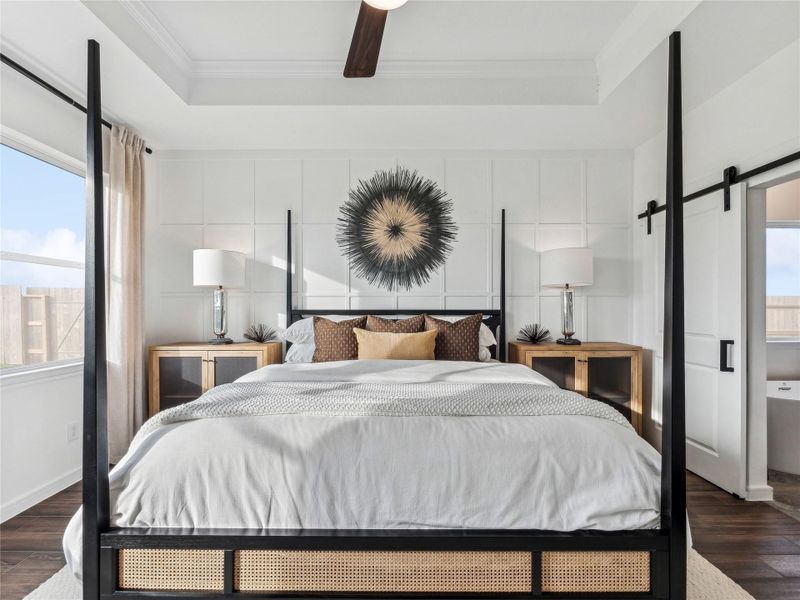 Primary bedroom with accent wall Primary bedroom with accent wall