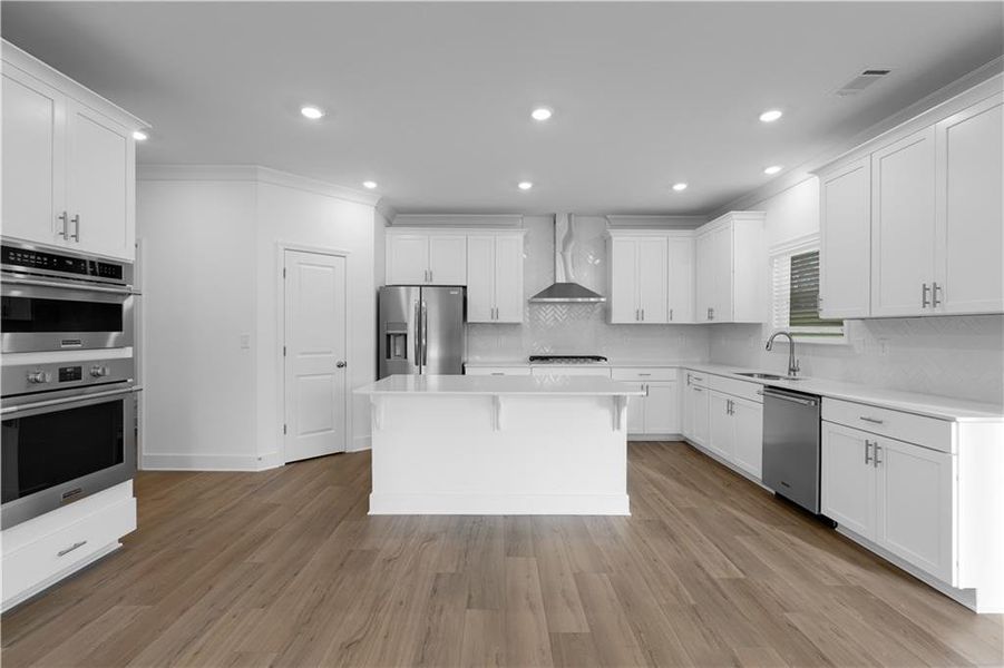 Furnished interior view inside a new home in Wellington Estates, Madison (Image 9).