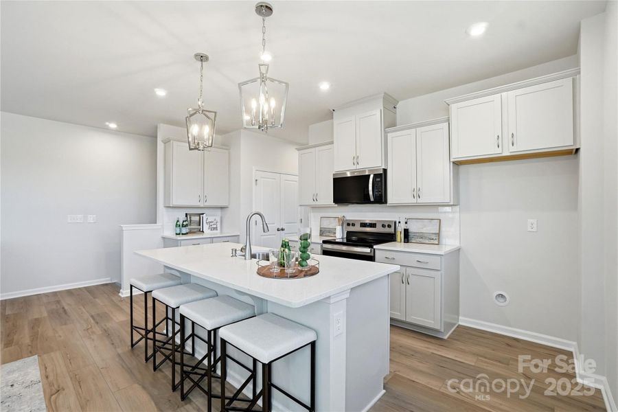 Representational only. Actual exterior elevation and interior finishes can vary.