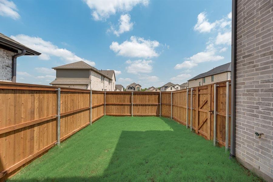 Exterior details and patio area of a home in Light Farms Brenham - 40' Lots, Celina (Image 3).