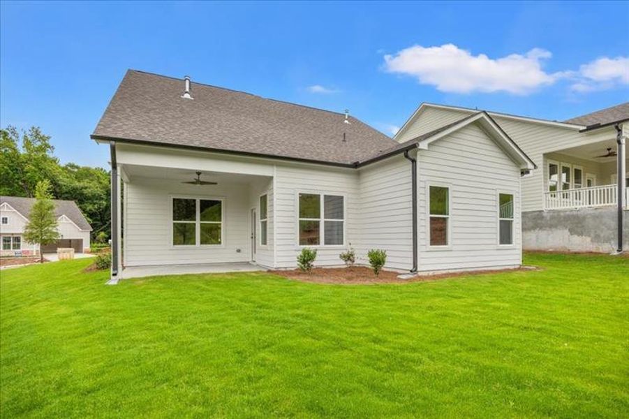 Front exterior of a new home in Cooks Farm, Woodstock, GA, highlighting curb appeal (Image 25).