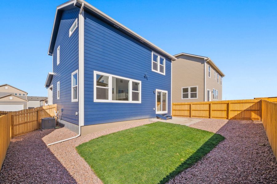 Exterior details and patio area of a home in Ridge at Lorson Ranch, Colorado Springs (Image 3).