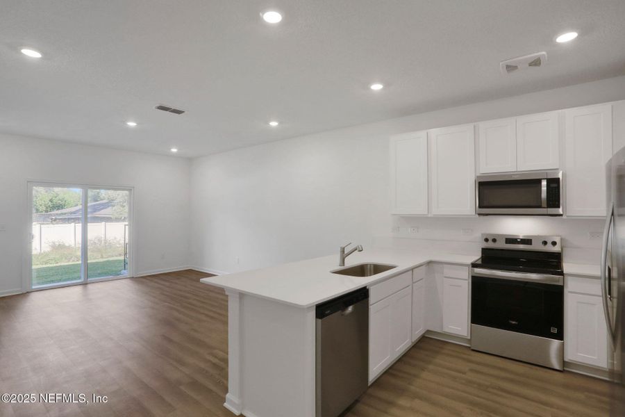 Furnished interior view inside a new home in , Jacksonville (Image 10).