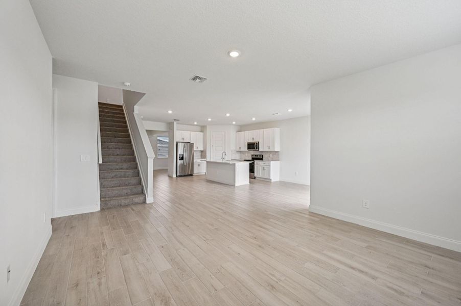 Spacious, unfurnished interior of a new home in Brystol at Wylder - Reserve Series, Port St. Lucie (Image 35).