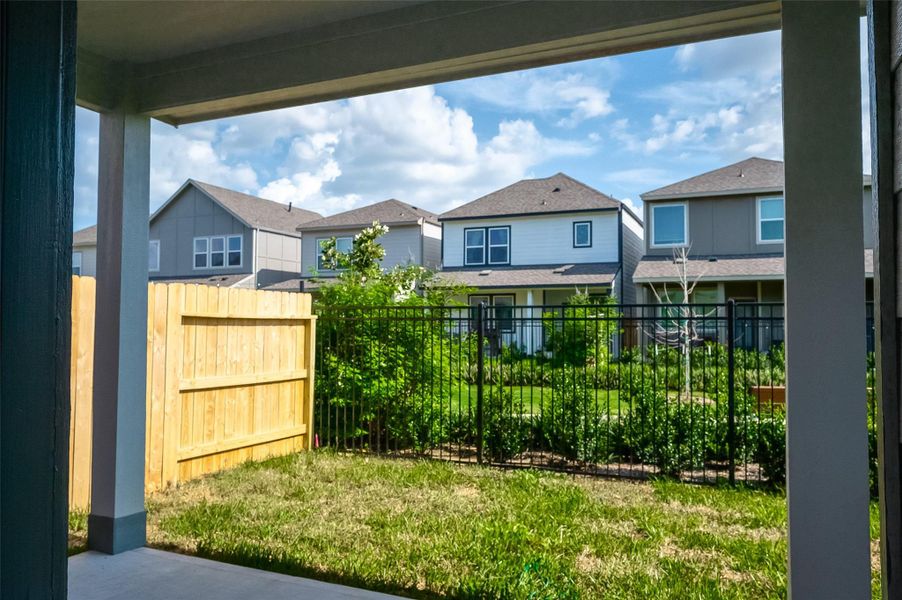 Front exterior of a new home in McClendon Park Village, Houston, TX, highlighting curb appeal (Image 25). Front exterior of a new home in McClendon Park Village, Houston, TX, highlighting curb appeal (Image 25).