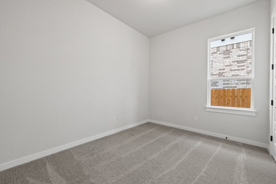 Spacious, unfurnished interior of a new home in Heritage, Dripping Springs (Image 23).