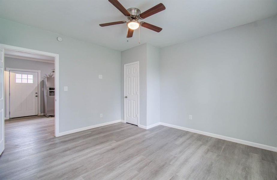 Second bedroom upgraded with ceiling fan with LED lighting