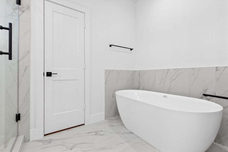 Primary bath with stand alone tub. Primary bath with stand alone tub.