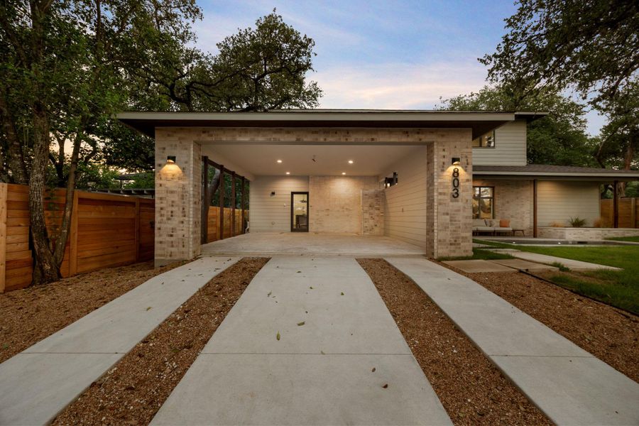 View of front of house featuring brick siding