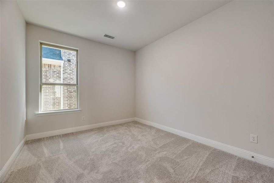 Spacious, unfurnished interior of a new home in Spiritas Ranch, Little Elm (Image 28).