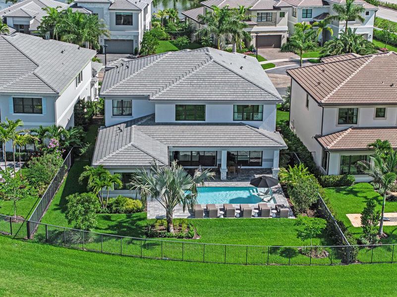Front exterior of a new home in Apex at Avenir, Palm Beach Gardens, FL, highlighting curb appeal (Image 28).