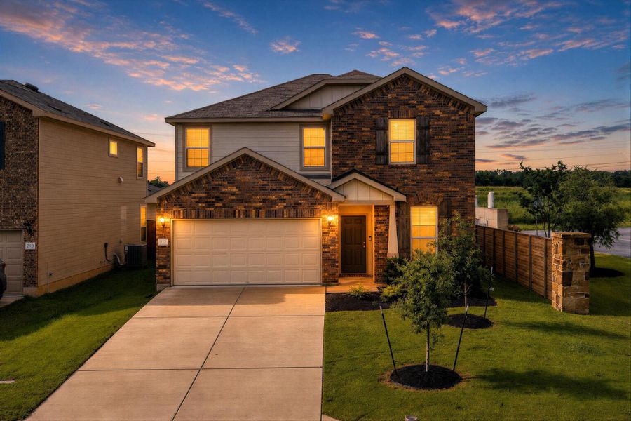 Front of the house features front entry 2 car garage. Front of the house features front entry 2 car garage.