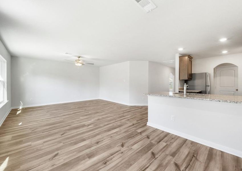 The family room of the Rio Grande sits next to the kitchen and dining rooms.