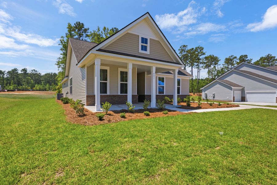 Front exterior of a new home in Oakleaf Chase, Blythewood, SC, highlighting curb appeal (Image 2). Front exterior of a new home in Oakleaf Chase, Blythewood, SC, highlighting curb appeal (Image 2).