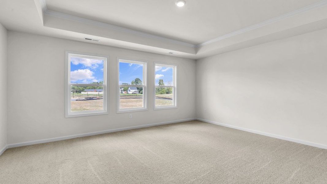 Representative unfurnished interior of a home built from the EDISTO by D.R. Horton in Eagle Creek, Fuquay Varina (Image 13).