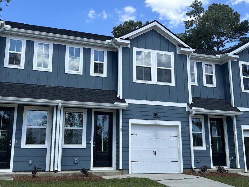 Front exterior of a new home in , Summerville, SC, highlighting curb appeal (Image 17).