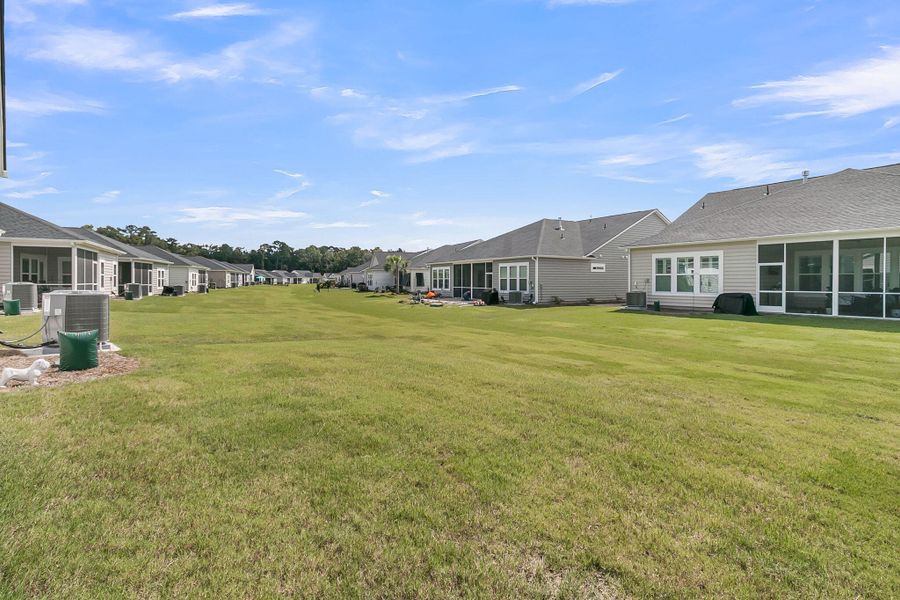 Front exterior of a new home in Horizons at Summers Corner | 55+: The Cottages, Summerville, SC, highlighting curb appeal (Image 30). Front exterior of a new home in Horizons at Summers Corner | 55+: The Cottages, Summerville, SC, highlighting curb appeal (Image 30).