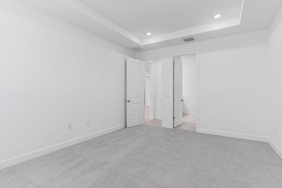 Representative unfurnished interior of a home built from the Azzurro by Taylor Morrison in Esplanade at Center Lake Ranch, St. Cloud (Image 23).