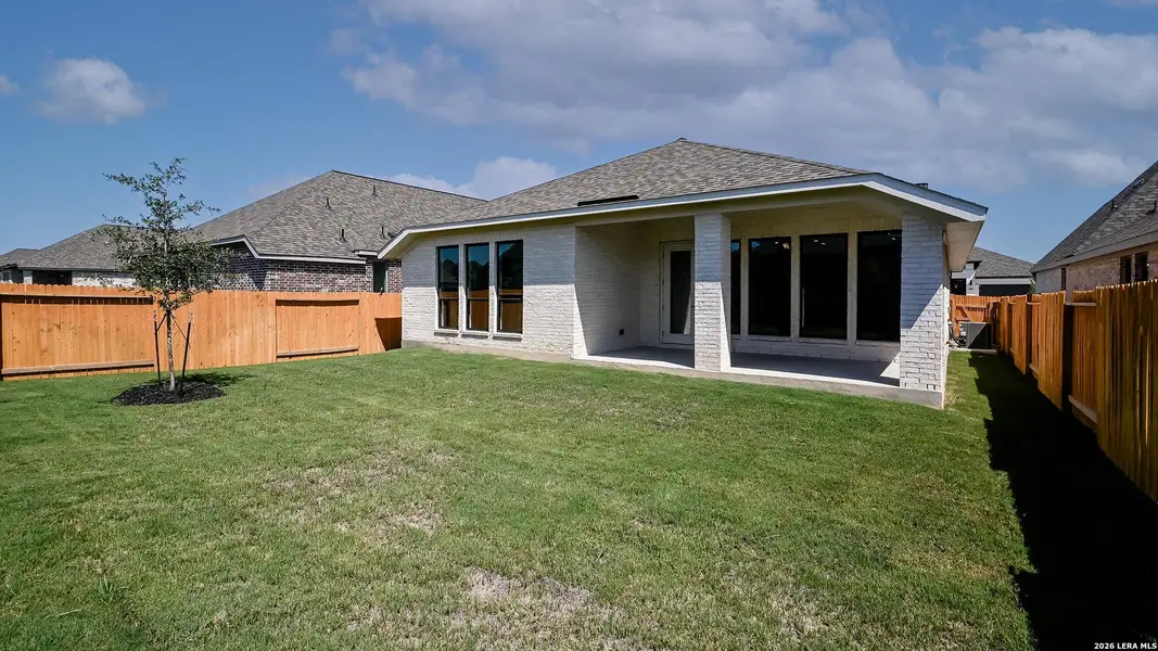 Exterior details and patio area of a home in Meadows of Mill Creek, Seguin (Image 4).
