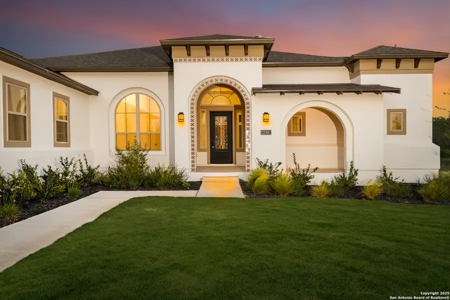 Front exterior of a new home in Legend Park, Castroville, TX, highlighting curb appeal (Image 2). Front exterior of a new home in Legend Park, Castroville, TX, highlighting curb appeal (Image 2).