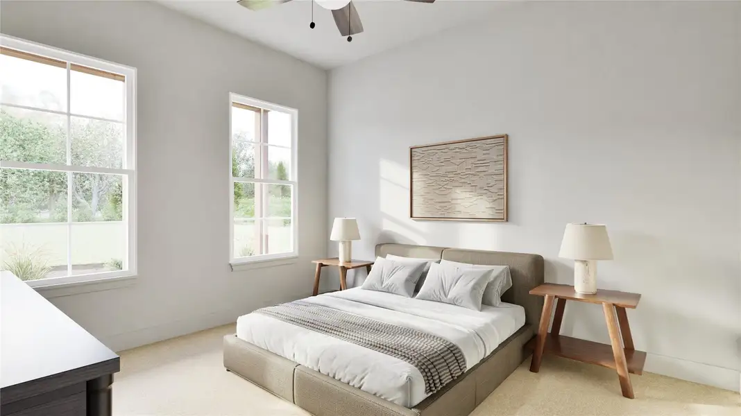 Secondary bedroom with two windows, providing plenty of natural light.