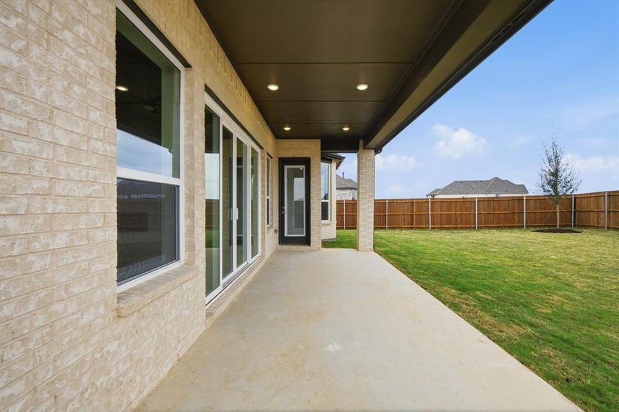 Exterior details and patio area of a home in Wildflower Ranch: 50ft. lots, Dish (Image 2).
